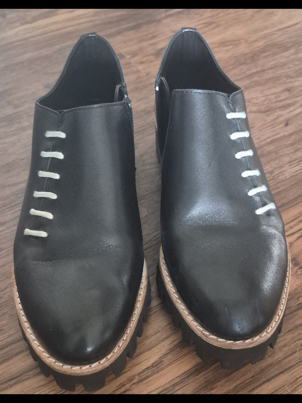 Black Slip-On Loafers with White Stitch Accents